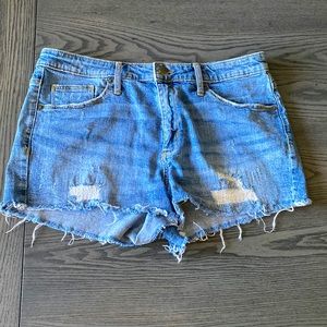 Distressed denim shorts